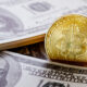 US Dollar and Bitcoin placed together to show investment concept