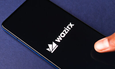 The WazirX logo on a phone