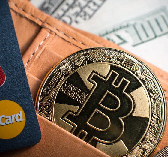 Debit cards, Bitcoin and dollar bills