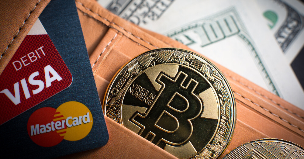 Debit cards, Bitcoin and dollar bills